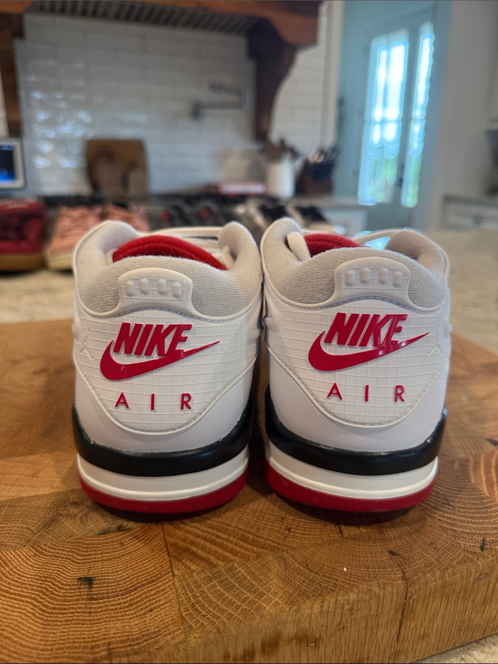 Men's Nike Air Jordan’s White and Black Low-Top Sneakers with Red Accent - Picture 2 of 4
